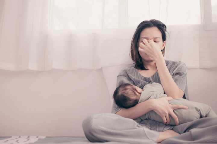 Postpartum Depression: Causes, Symptoms & Treatment