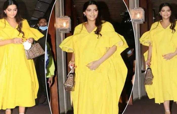 Mom-to-be Sonam Kapoor in bright yellow dress steps out in Mumbai. Pics here